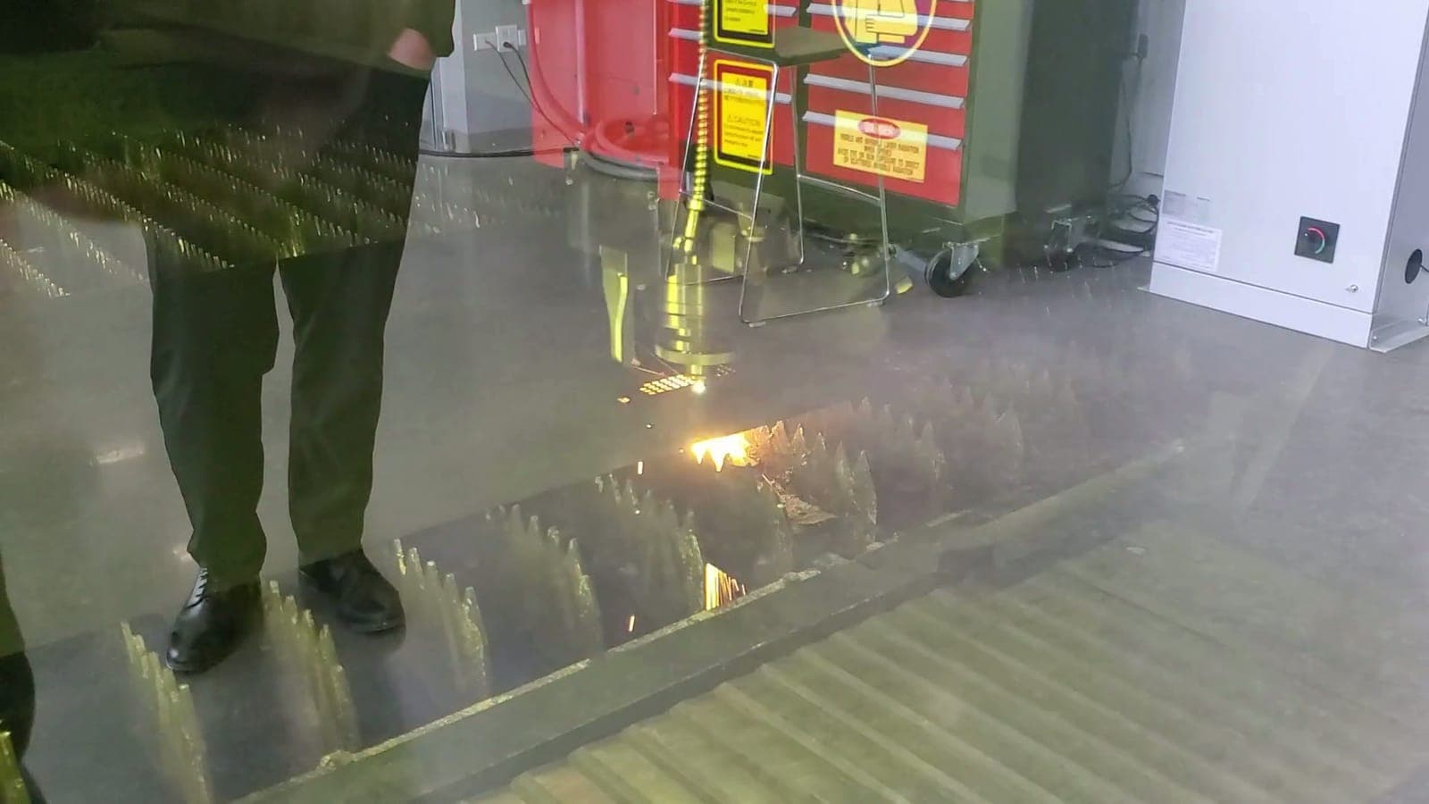 The Mitsubishi 6kW fiber laser cutting at Steward Metal Fabricating